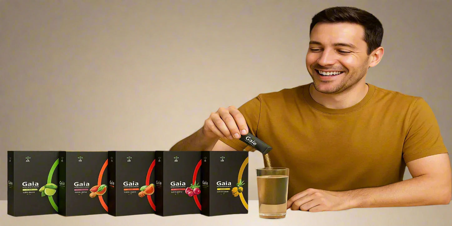 Man pouring a supplement into a glass with Gaia Health product boxes in the background.