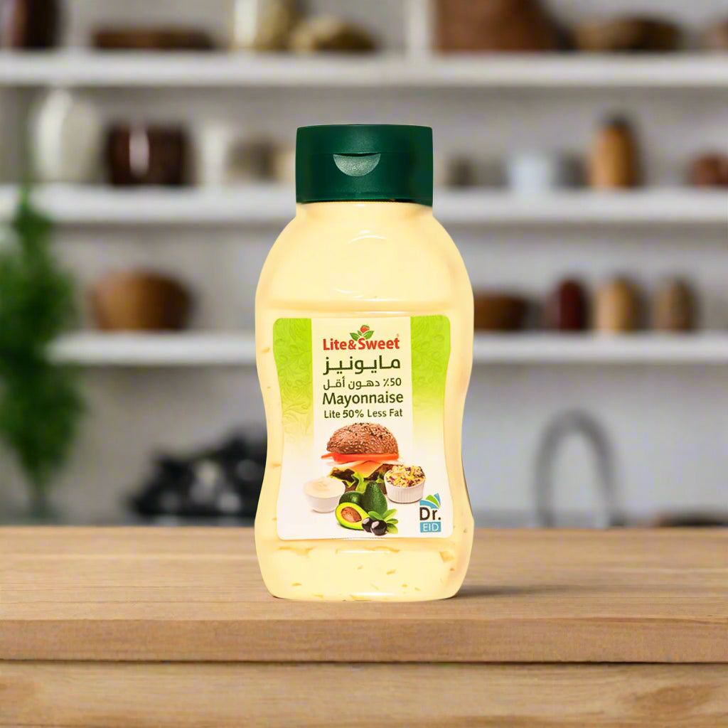 Bottle of Lite & Sweet Healthy Mayonnaise Less Fat 500g with a green cap on a plain background.